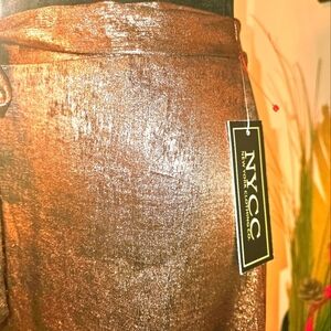 NYCC Gold shiny skirt with front split and belt. Size M.